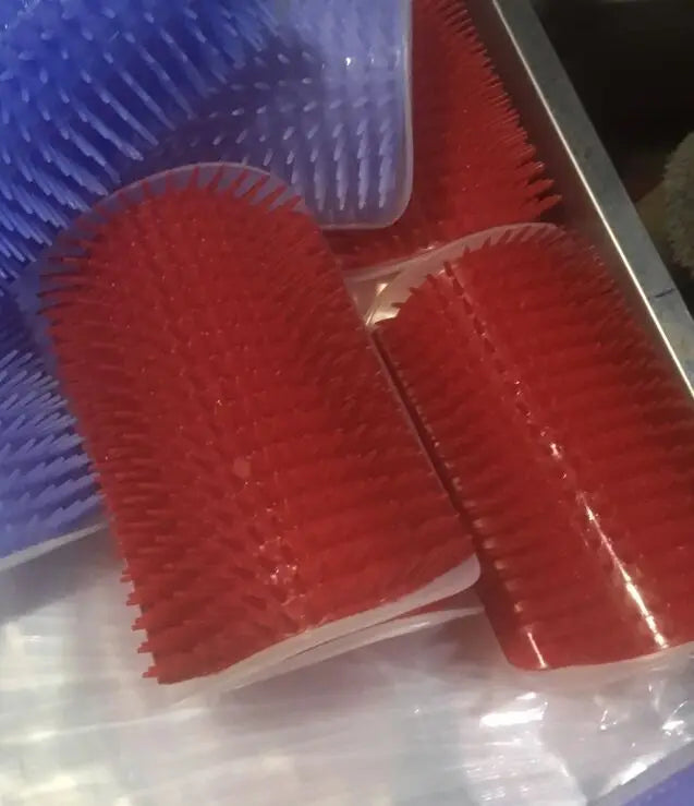 Brosse auto-nettoyante & masseur pour chat